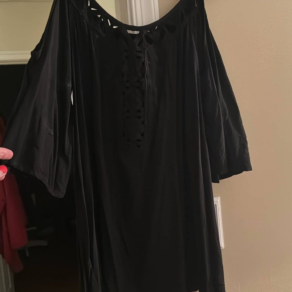 Solitaire swim women’s black top with pretty  cut outs